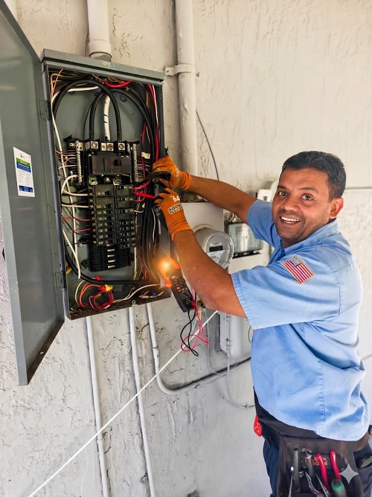 Mr. Electric technician testing a residential electrical panel