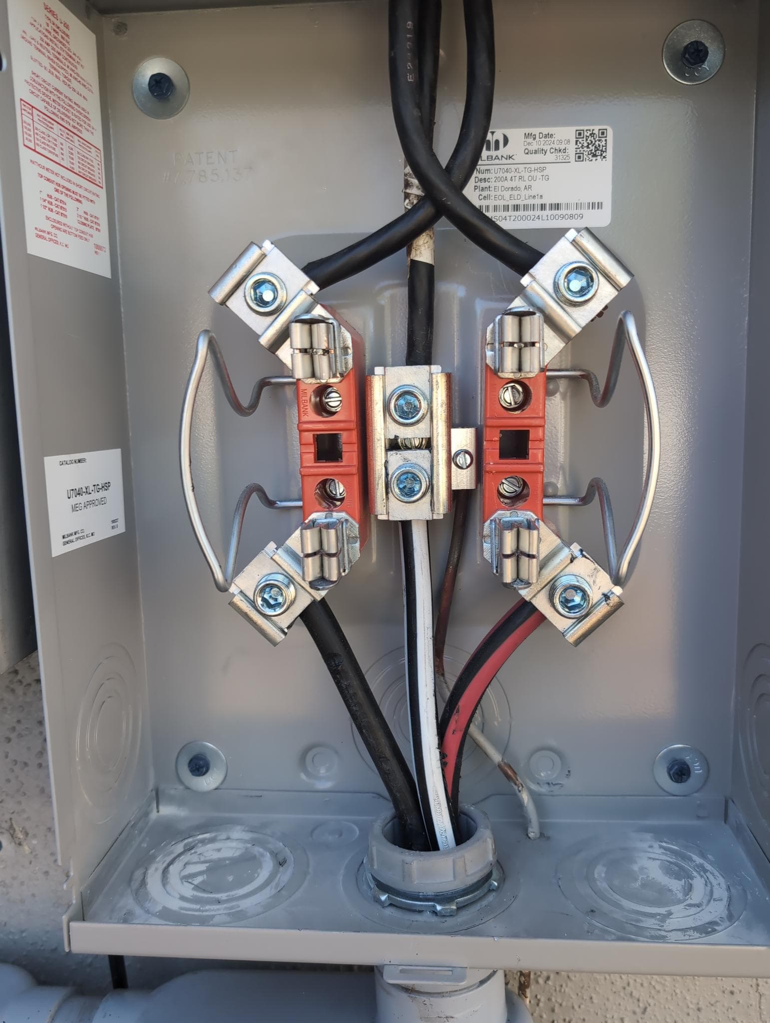 Close-up of meter base wiring after electrical service work