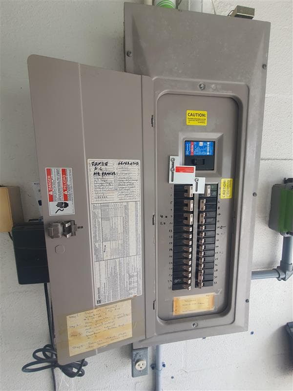 Open residential electrical panel inspected by Mr. Electric of Winter Haven